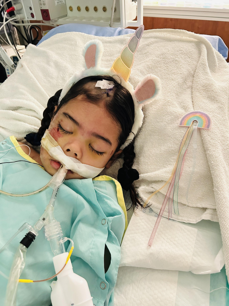 Six-year-old "Kaia" in Pediatric ICU. Image use with permission of family.